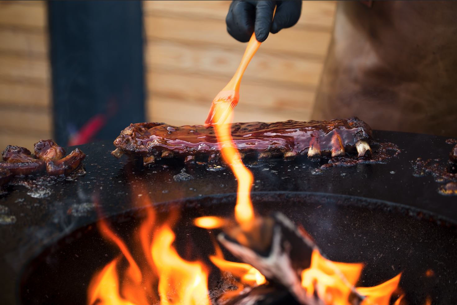 Texas-style slow-smoked beef brisket sliced thin with rich dark bark at Lil Alex BBQ